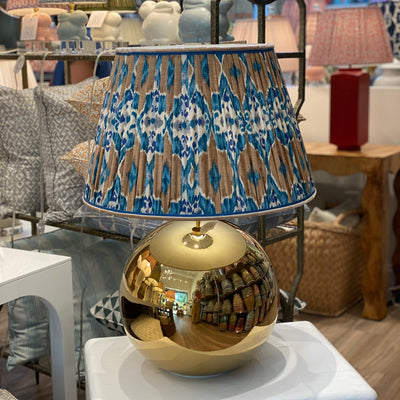 Large gold ball lamp with an ikat lampshade