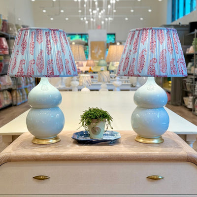 Hwang Bishop Nanjing Lamp in Sky with a Peter Bishop lampshade in a red amd blue Kashmir Paisley print. 