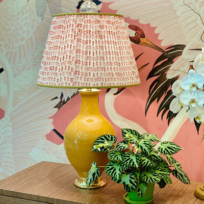 Paul Schneider Athens Mustard lamp with pink flower block print lampshade.