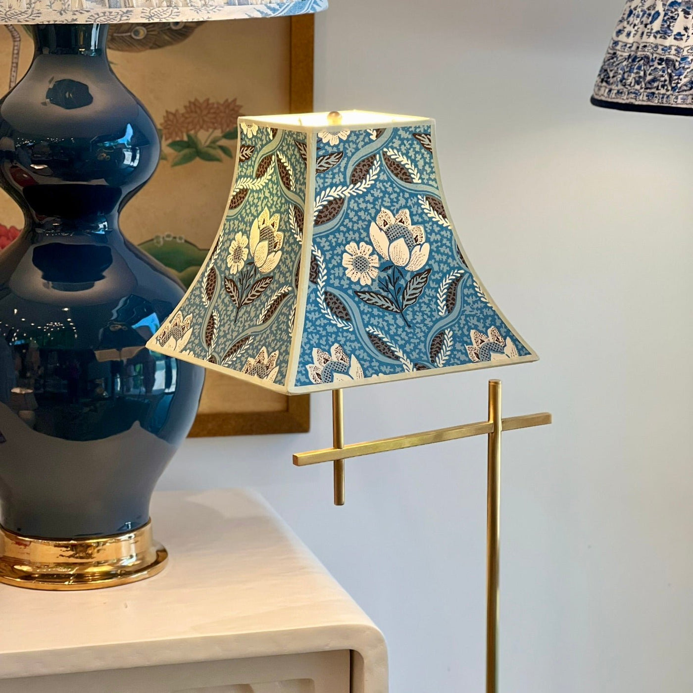 Pierre Frey Square Bell Lampshade on a Brass Floor Lamp