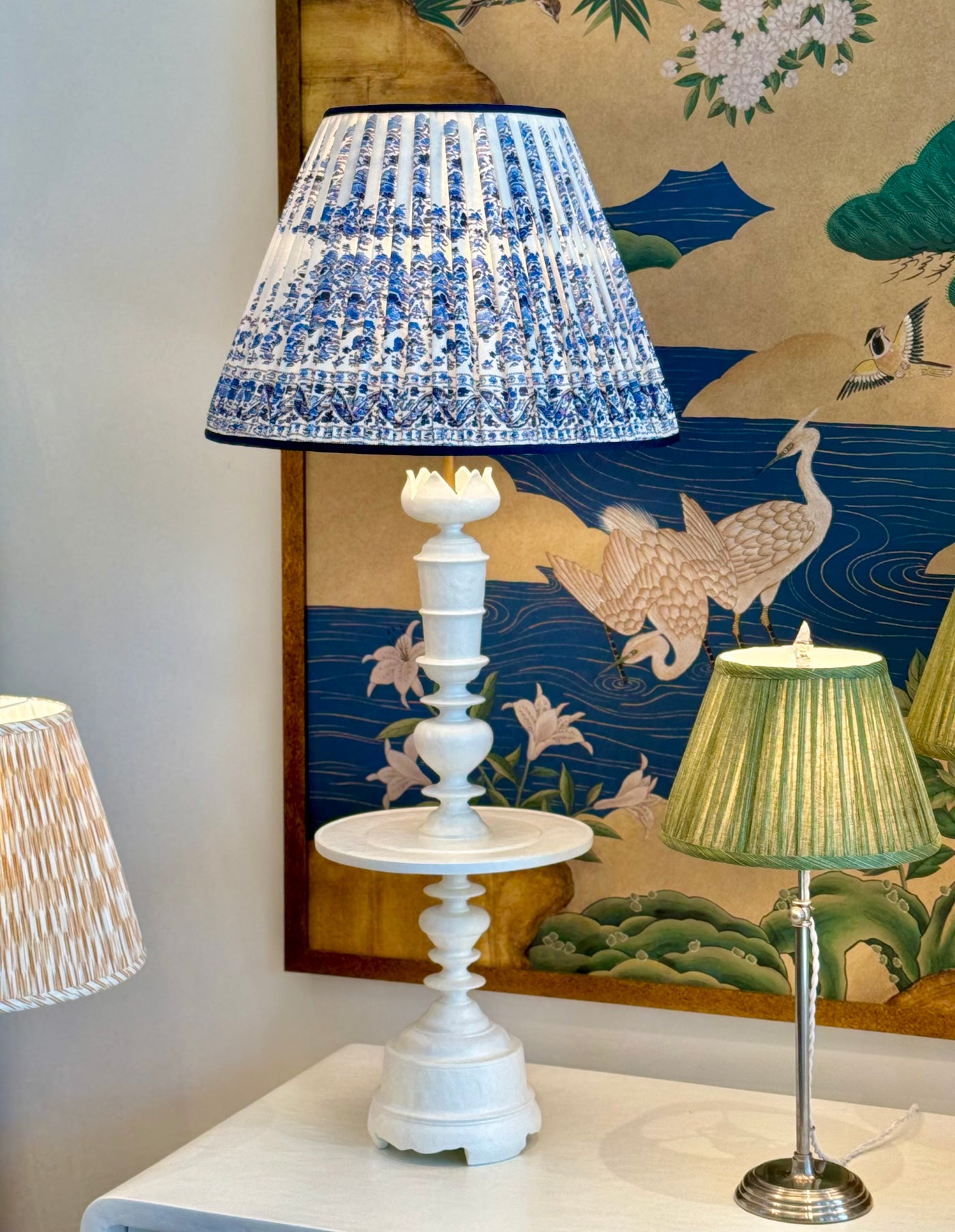 Large white lamp and blue and white lampshade