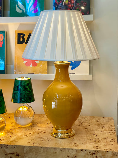 Silk box pleat lampshade on mustard ceramic lamp