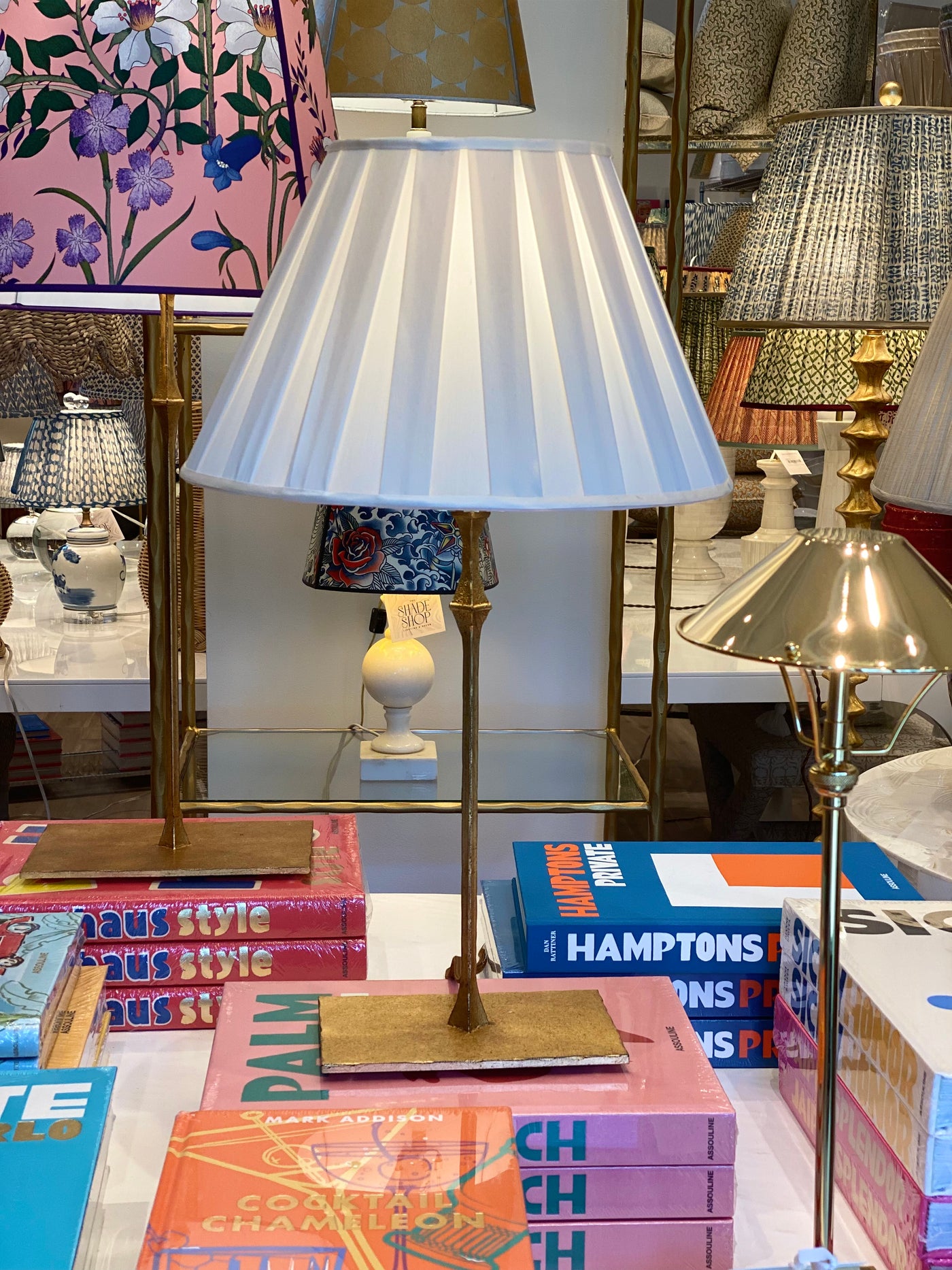 Empire silk box pleat lampshade on a brass Dauphine Lamp