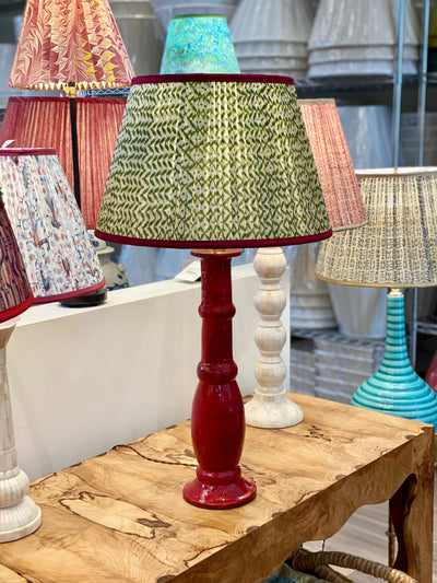 Penny Morrison Green Trellis Lampshade on a red lamp