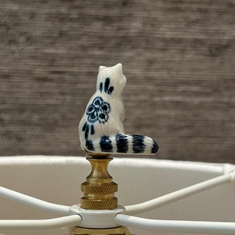 racoon lamp finial detail