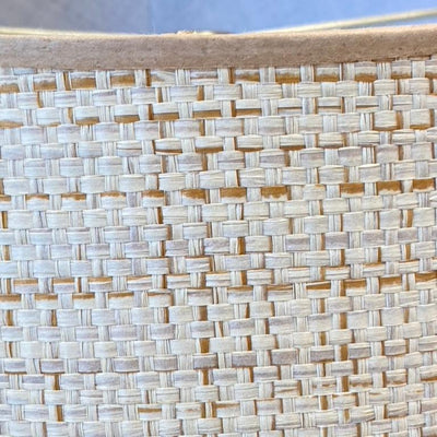 scalloped raffia lampshade with beige trim close up