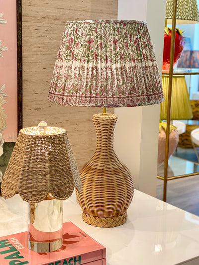 Ian Sanderson pink and green lampshade on a rattan lamp